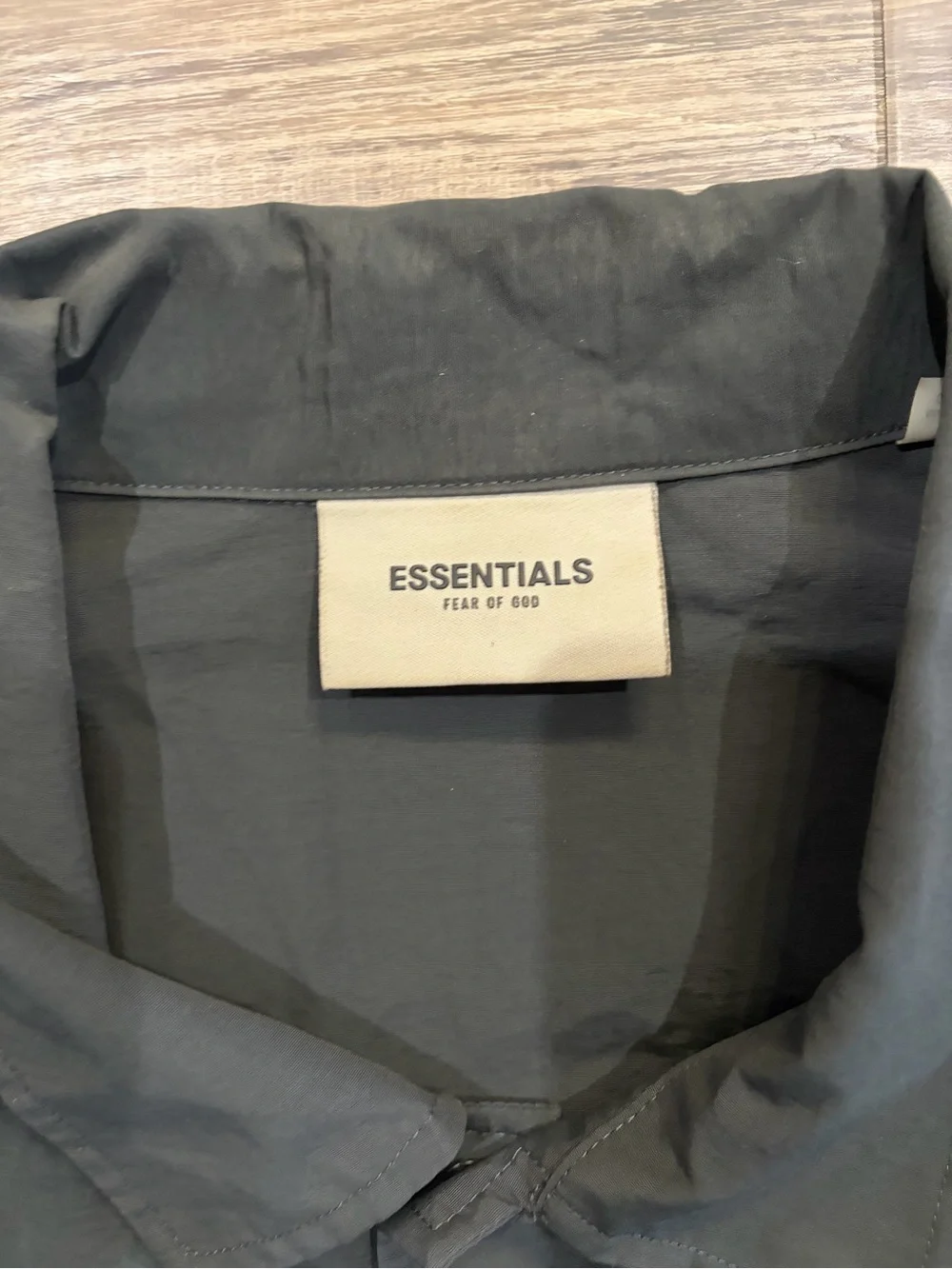 Fear of God Essentials BlacFear of God Essentials Black Nylon Windbreaker Jacket